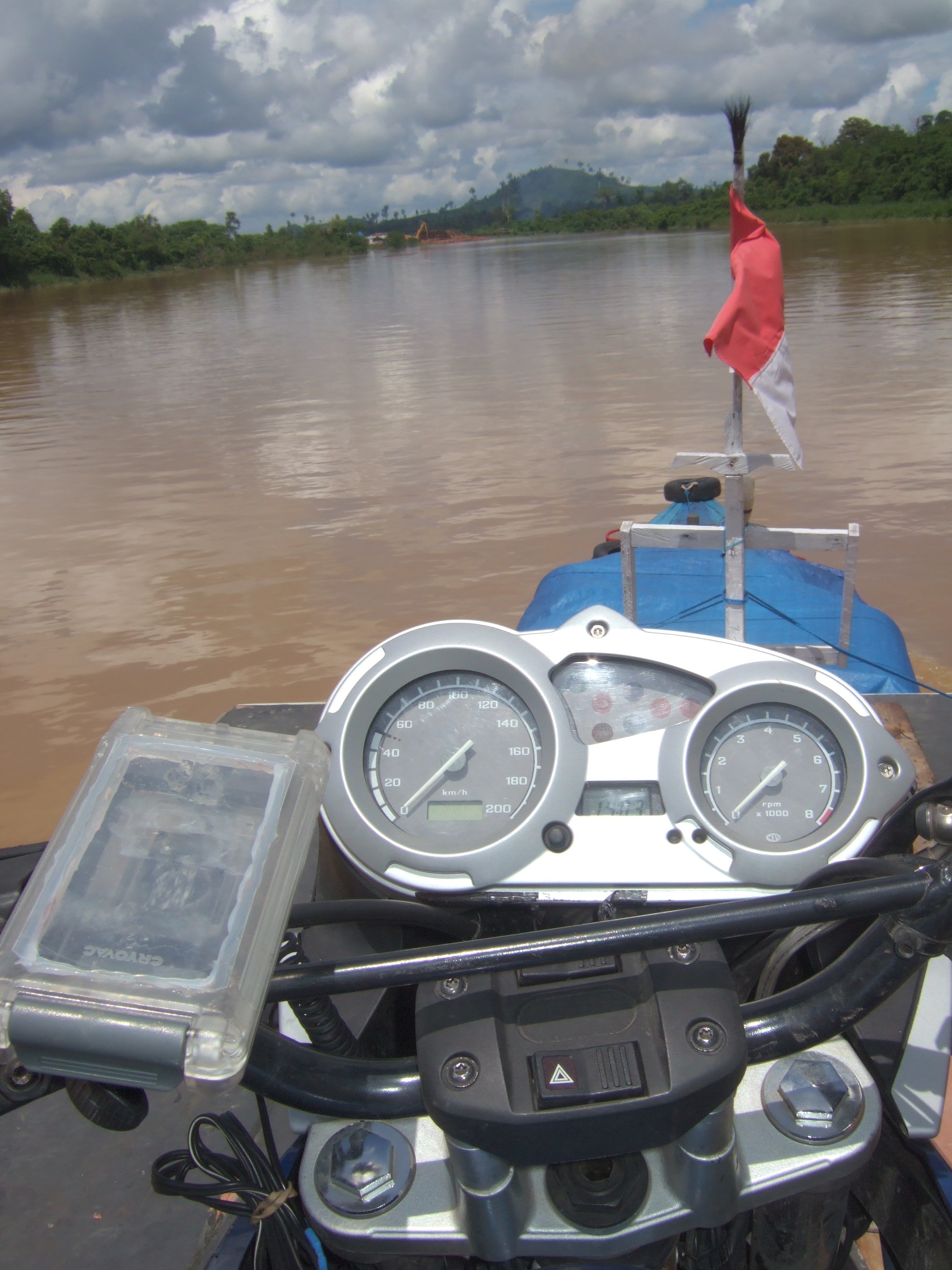 bike on the roof of a river boat in Borneo